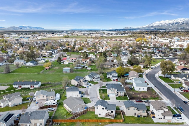 818 W 530 S, Logan, UT 84321 - aerial view of property's location with a mountain backdrop and nearby suburban area