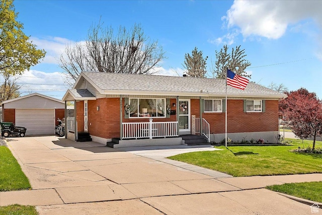ranch-style home featuring brick siding, a porch, a garage, and an outdoor structure