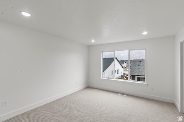 556 N 800 W, Smithfield, UT 84335 - spare room with light carpet, visible vents, and baseboards