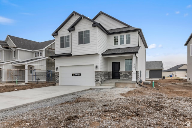 556 N 800 W, Smithfield, UT 84335 - craftsman inspired home with stone siding, an attached garage, fence, and concrete driveway