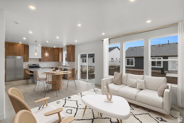 556 N 800 W, Smithfield, UT 84335 - living room featuring recessed lighting, light wood-style floors, and a wealth of natural light