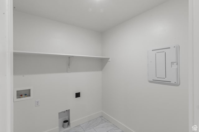 556 N 800 W, Smithfield, UT 84335 - clothes washing area with hookup for a washing machine, electric dryer hookup, marble finish floor, baseboards, and laundry area