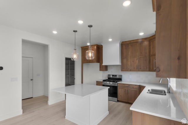 556 N 800 W, Smithfield, UT 84335 - kitchen with a sink, light wood-type flooring, gas range, light countertops, and recessed lighting