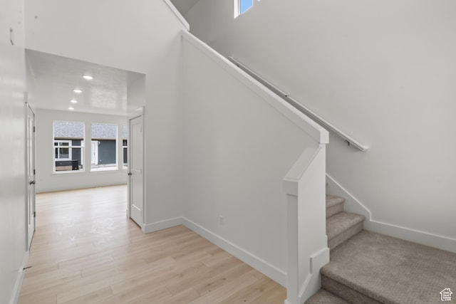 556 N 800 W, Smithfield, UT 84335 - staircase featuring recessed lighting, wood finished floors, a wealth of natural light, and baseboards
