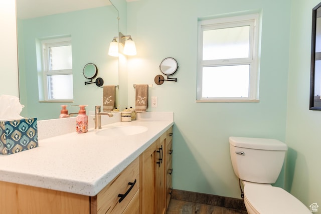 1550 E 2100 N, North Logan, UT 84341 - half bath with plenty of natural light, vanity, toilet, and baseboards