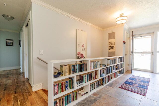 1550 E 2100 N, North Logan, UT 84341 - hall featuring a textured ceiling, baseboards, and ornamental molding