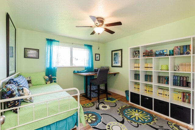 1550 E 2100 N, North Logan, UT 84341 - bedroom with baseboards, a ceiling fan, and wood finished floors