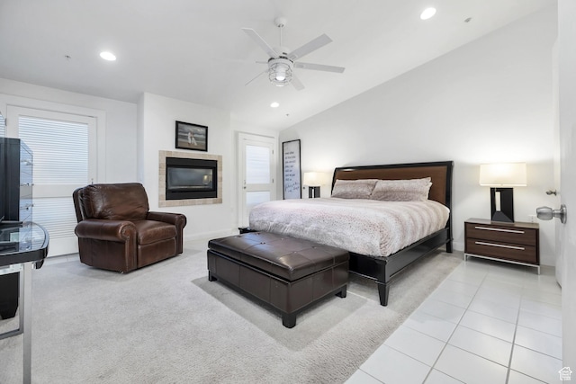 1999 W Canyon Dr Unit 3, St George, UT 84770 - bedroom featuring a ceiling fan, a tiled fireplace, lofted ceiling, tile patterned flooring, and recessed lighting
