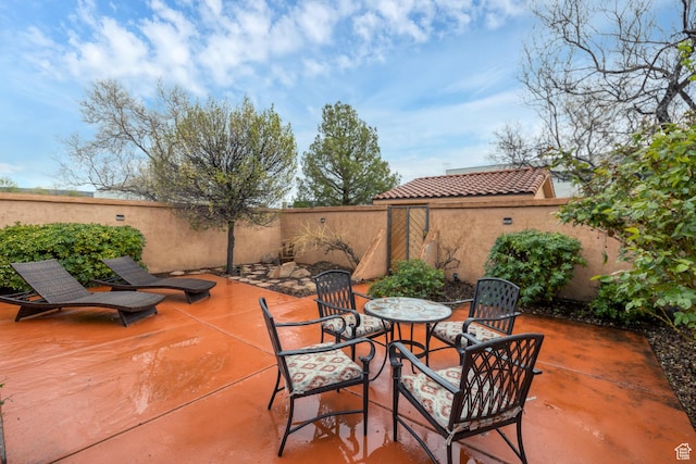 1999 W Canyon Dr Unit 3, St George, UT 84770 - view of patio featuring a fenced backyard