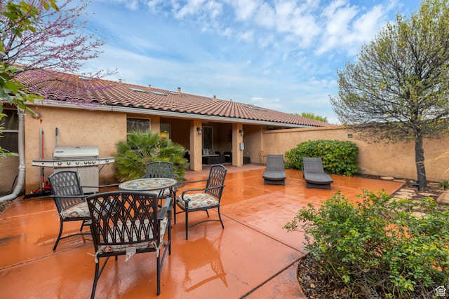 1999 W Canyon Dr Unit 3, St George, UT 84770 - view of patio with a grill, fence, and outdoor dining space