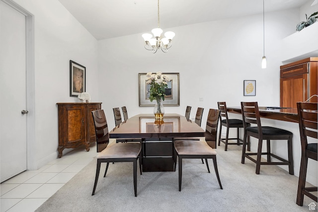 1999 W Canyon Dr Unit 3, St George, UT 84770 - dining space featuring baseboards, high vaulted ceiling, a notable chandelier, and light tile patterned floors