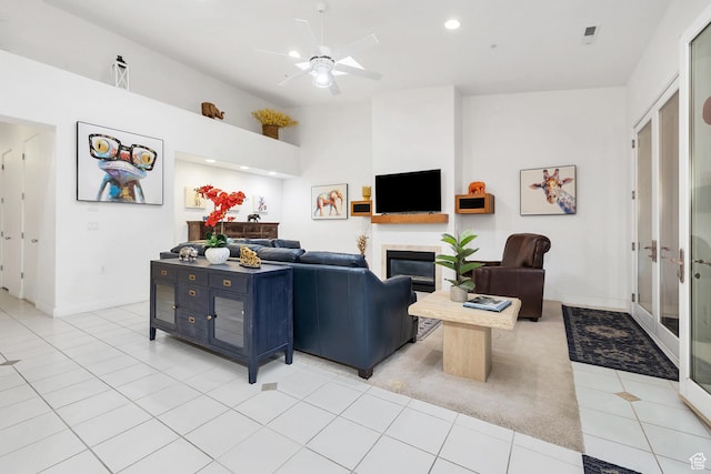 1999 W Canyon Dr Unit 3, St George, UT 84770 - living area featuring a ceiling fan, light tile patterned flooring, a glass covered fireplace, baseboards, and recessed lighting