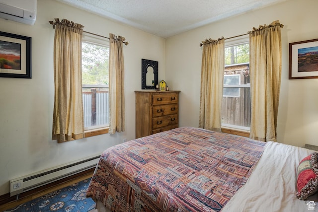 168 S 100 W, Moab, UT 84532 - bedroom featuring a baseboard radiator and a wall mounted AC