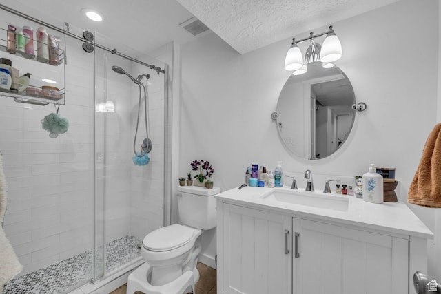 1578 W Andover Rd S, South Jordan, UT 84095 - full bathroom featuring a textured ceiling, a stall shower, toilet, visible vents, and vanity