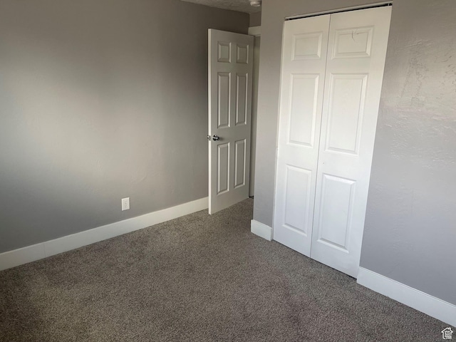 235 W 200 S, Vernal, UT 84078 - unfurnished bedroom featuring baseboards, carpet, and a closet
