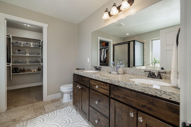1394 S 1700 W, Vernal, UT 84078 - full bath featuring baseboards, a spacious closet, a stall shower, and a sink
