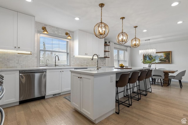 56 S 1000 E, Springville, UT 84663 - kitchen featuring dishwasher, a sink, a chandelier, a center island with sink, and recessed lighting