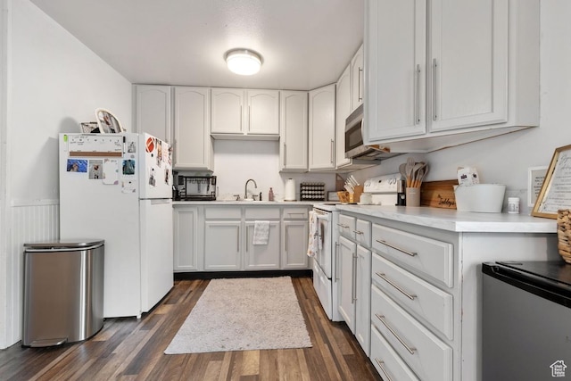56 S 1000 E, Springville, UT 84663 - kitchen featuring white appliances, dark wood-type flooring, a sink, white cabinets, and light countertops