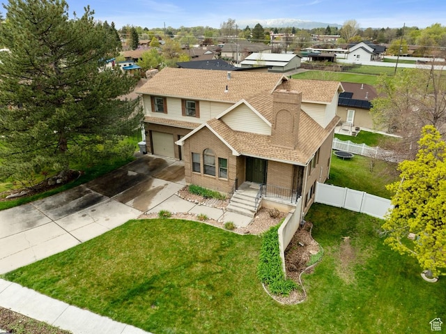 56 S 1000 E, Springville, UT 84663 - view of front of property featuring concrete driveway, a garage, brick siding, and a shingled roof