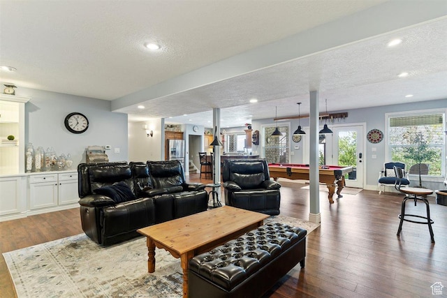 living room featuring recessed lighting, billiards, dark wood-style flooring, and a textured ceiling