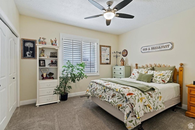 bedroom with carpet floors, baseboards, a ceiling fan, and a closet