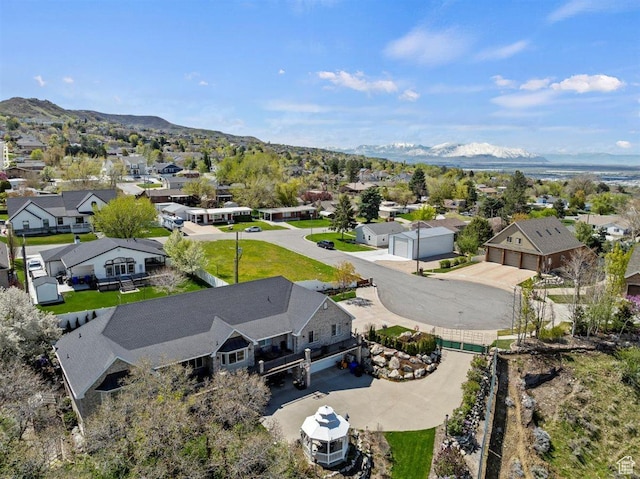 birds eye view of property featuring a residential view and a mountain view