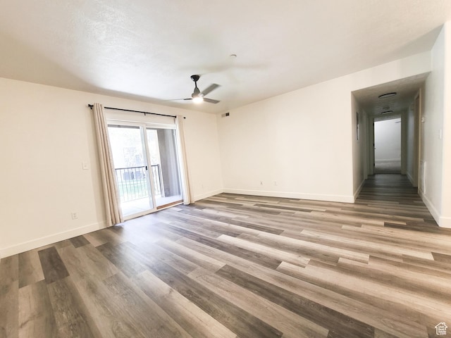 317 S 1000 W Unit 103, Pleasant Grove, UT 84062 - empty room featuring baseboards, a ceiling fan, and wood finished floors