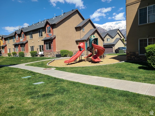 317 S 1000 W Unit 103, Pleasant Grove, UT 84062 - community playground featuring a lawn, central air condition unit, and a residential view