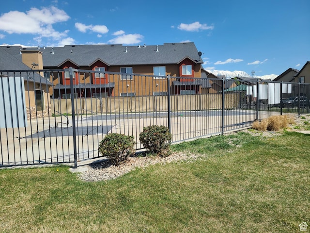 317 S 1000 W Unit 103, Pleasant Grove, UT 84062 - community pool featuring a yard, fence, a patio area, and a residential view