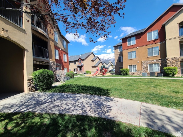 317 S 1000 W Unit 103, Pleasant Grove, UT 84062 - view of property's community with a yard, playground community, and a residential view
