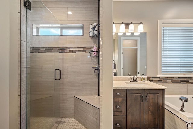 4423 Ranch Blvd, Mountain Green, UT 84050 - full bathroom featuring a stall shower, a garden tub, and vanity