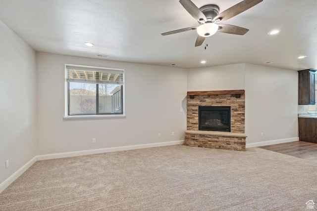 4423 Ranch Blvd, Mountain Green, UT 84050 - unfurnished living room featuring carpet flooring, ceiling fan, a fireplace, baseboards, and recessed lighting