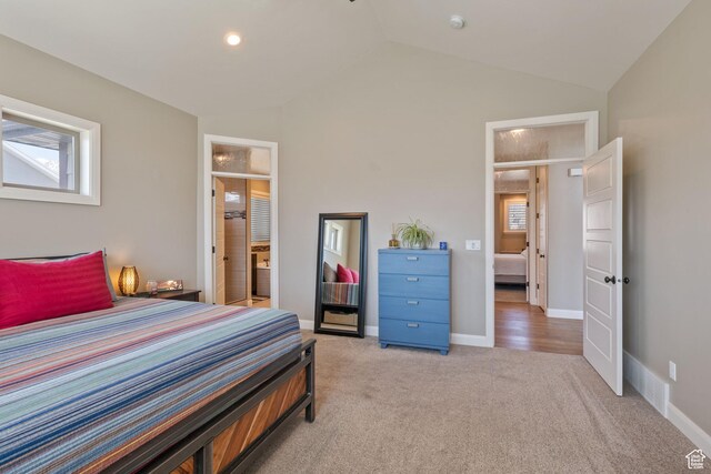 4423 Ranch Blvd, Mountain Green, UT 84050 - bedroom with lofted ceiling, light colored carpet, and baseboards