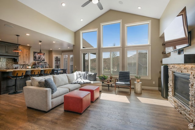 4423 Ranch Blvd, Mountain Green, UT 84050 - living room with ceiling fan, dark wood-type flooring, a fireplace, high vaulted ceiling, and recessed lighting