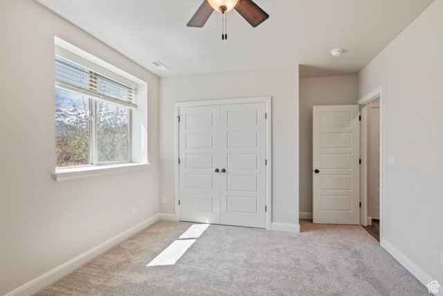 4423 Ranch Blvd, Mountain Green, UT 84050 - unfurnished bedroom with carpet floors, baseboards, a closet, and ceiling fan