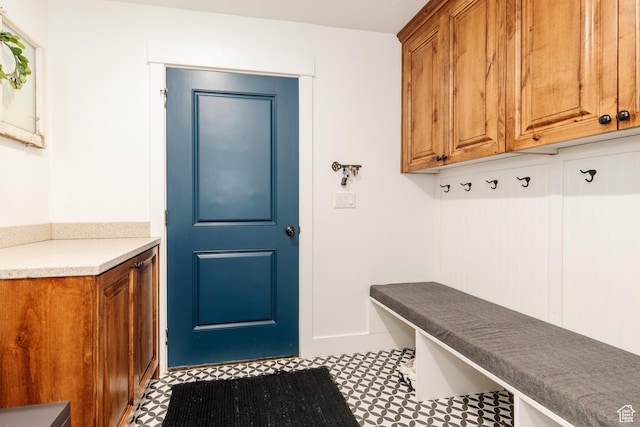 mudroom with tile patterned floors