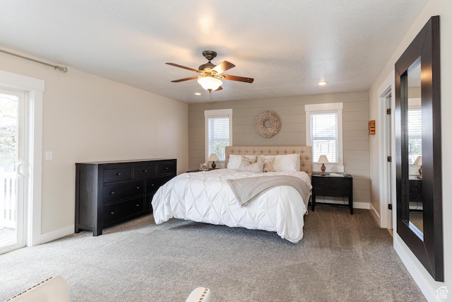 carpeted bedroom featuring a ceiling fan, baseboards, recessed lighting, and access to exterior