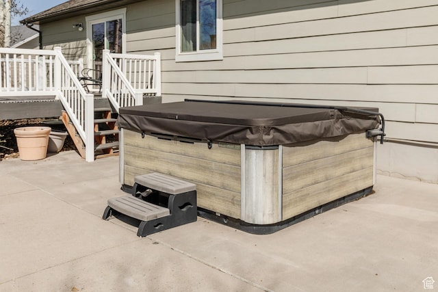 view of patio featuring a hot tub