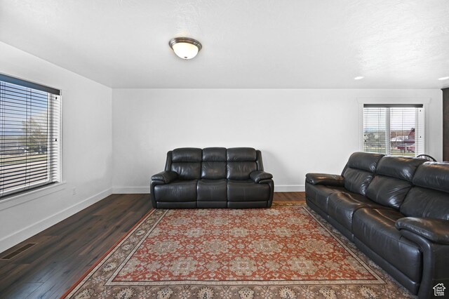 8050 W 1900 N, Petersboro, UT 84325 - living room with visible vents, dark wood finished floors, and baseboards