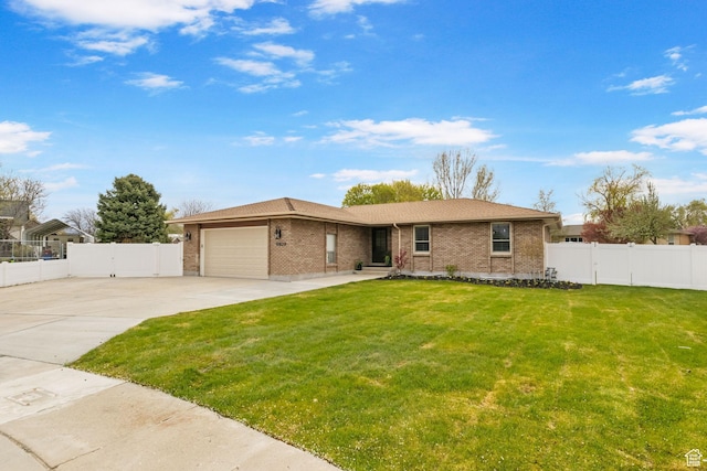 ranch-style house featuring concrete driveway, an attached garage, fence, a front yard, and brick siding