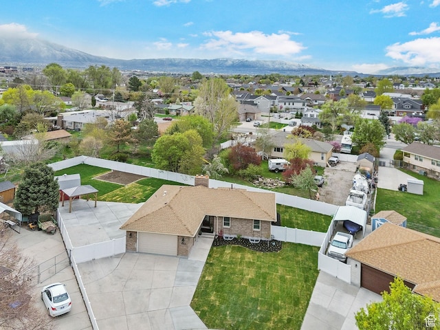 bird's eye view with a mountain view and a residential view