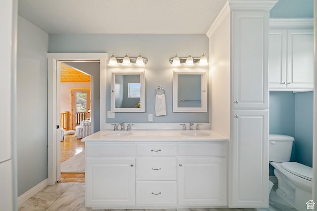 2592 S 2900 E, New Harmony, UT 84757 - bathroom with marble finish floor, double vanity, toilet, and a sink