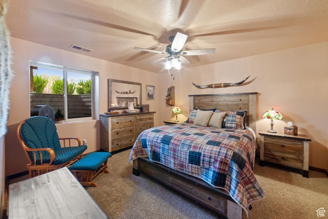 2592 S 2900 E, New Harmony, UT 84757 - bedroom with a textured ceiling, visible vents, carpet flooring, and a ceiling fan