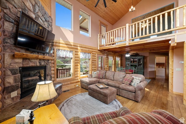 2592 S 2900 E, New Harmony, UT 84757 - living area with log walls, high vaulted ceiling, and ceiling fan