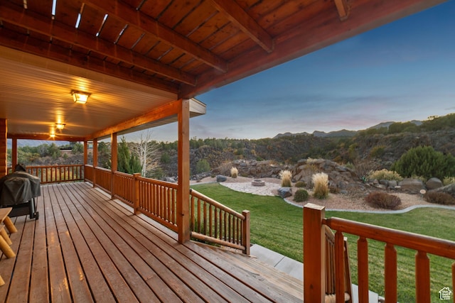 2592 S 2900 E, New Harmony, UT 84757 - deck at dusk featuring a yard and a mountain view