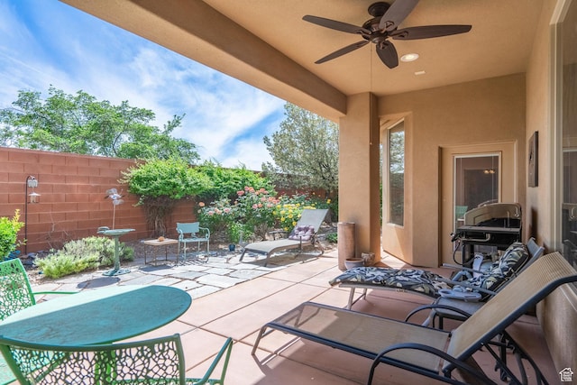 view of patio / terrace featuring a fenced backyard and ceiling fan