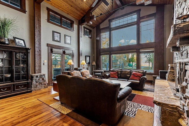 57 E 445 S, Garden City, UT 84028 - living room featuring wood ceiling, wood-type flooring, beamed ceiling, and high vaulted ceiling