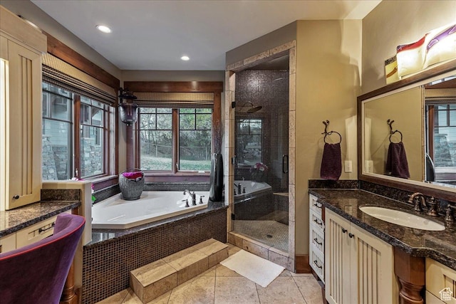 57 E 445 S, Garden City, UT 84028 - bathroom with a shower stall, a bath, vanity, tile patterned flooring, and recessed lighting