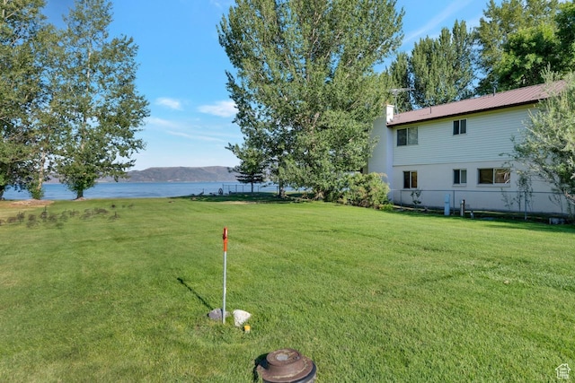 57 E 445 S, Garden City, UT 84028 - view of yard with fence and a water and mountain view