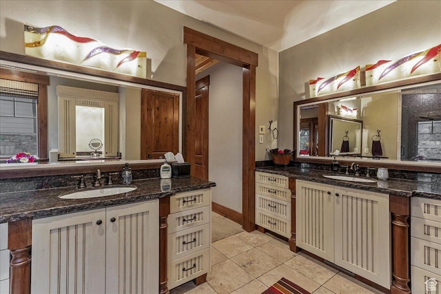 57 E 445 S, Garden City, UT 84028 - bathroom featuring baseboards, vanity, and tile patterned floors